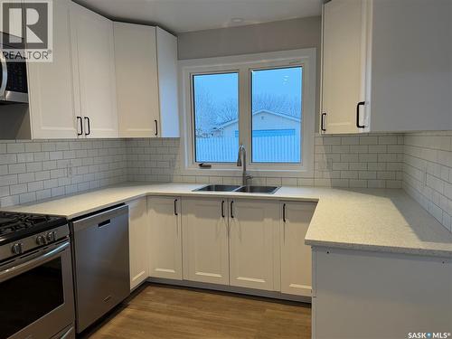 60 Ritchie Crescent, Regina, SK - Indoor Photo Showing Kitchen With Double Sink