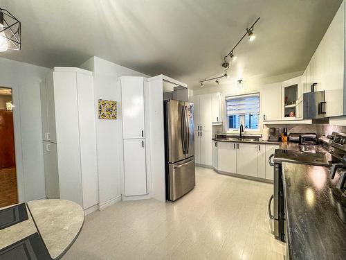 Cuisine - 4 Rue Hamelin, Lachute, QC - Indoor Photo Showing Kitchen With Double Sink
