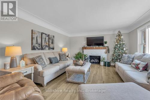 436 Broadway Street, Tillsonburg, ON - Indoor Photo Showing Living Room With Fireplace