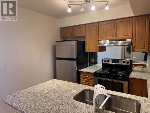 621 - 60 Fairfax Crescent, Toronto, ON - Indoor Photo Showing Kitchen With Double Sink