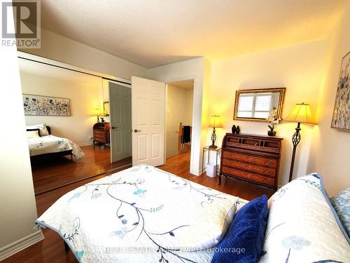 Double mirror closet & organizers - 257 Milan Street, Toronto, ON - Indoor Photo Showing Bedroom