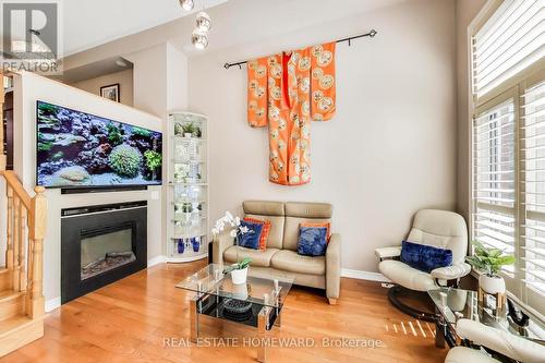 Electric fireplace - 257 Milan Street, Toronto, ON - Indoor Photo Showing Living Room With Fireplace