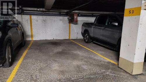 1406 - 2020 Jasmine Crescent, Ottawa, ON - Indoor Photo Showing Garage