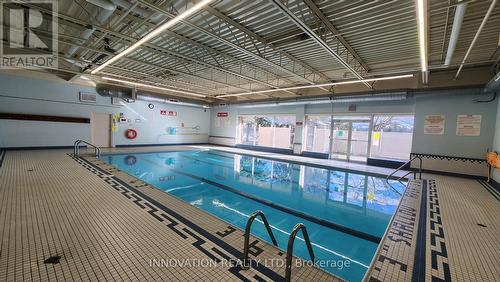 1406 - 2020 Jasmine Crescent, Ottawa, ON - Indoor Photo Showing Other Room With In Ground Pool
