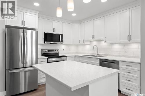 202 318 108Th Street W, Saskatoon, SK - Indoor Photo Showing Kitchen With Stainless Steel Kitchen With Upgraded Kitchen