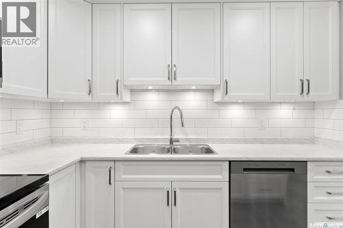 202 318 108Th Street W, Saskatoon, SK - Indoor Photo Showing Kitchen With Double Sink With Upgraded Kitchen