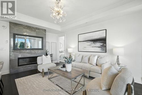 404 - 2060 Lakeshore Road, Burlington, ON - Indoor Photo Showing Living Room With Fireplace