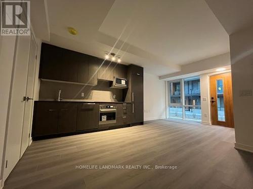 212 - 65 Curlew Drive, Toronto, ON - Indoor Photo Showing Kitchen