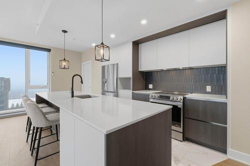 Coin-repas - 1202-2835 Av. Du Cosmodôme, Laval (Chomedey), QC - Indoor Photo Showing Kitchen With Upgraded Kitchen
