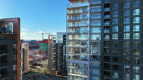 Vue d'ensemble - 1202-2835 Av. Du Cosmodôme, Laval (Chomedey), QC - Outdoor With Facade
