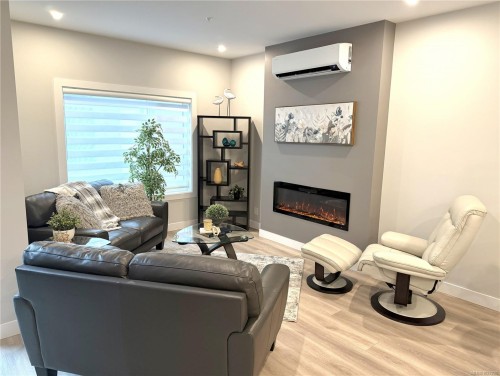 505-918 Jenkins Ave, Langford, BC - Indoor Photo Showing Living Room With Fireplace