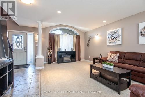383 Parrott Place, Woodstock, ON - Indoor Photo Showing Living Room With Fireplace