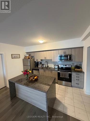 615 - 4 Spice Way, Barrie, ON - Indoor Photo Showing Kitchen With Stainless Steel Kitchen