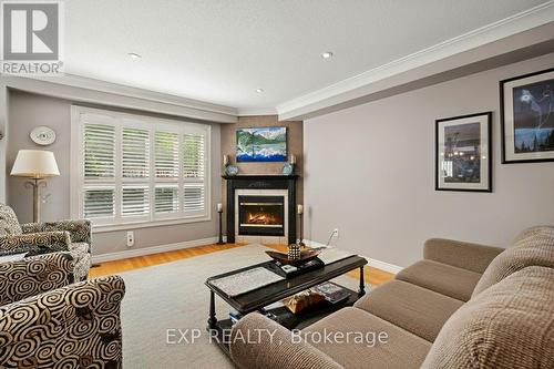22 - 130 Robert Street, Milton, ON - Indoor Photo Showing Living Room With Fireplace