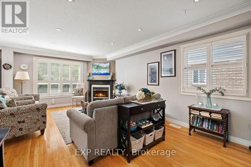 22 - 130 Robert Street, Milton, ON - Indoor Photo Showing Living Room With Fireplace