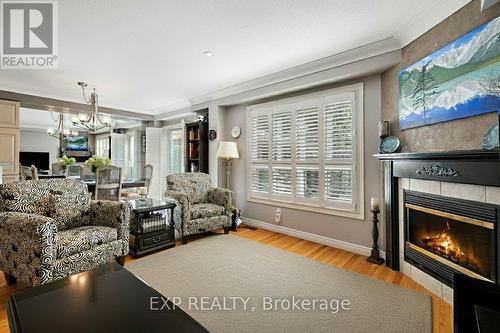 22 - 130 Robert Street, Milton, ON - Indoor Photo Showing Living Room With Fireplace