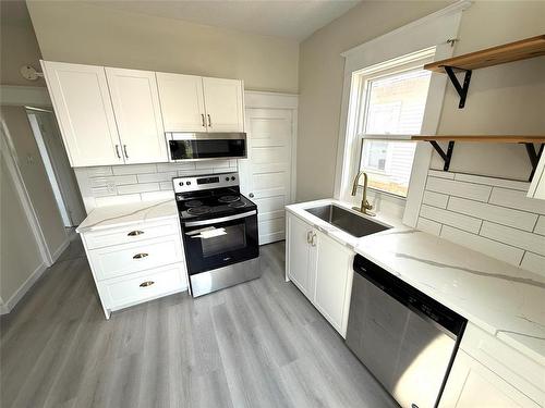 672 Machray Avenue, Winnipeg, MB - Indoor Photo Showing Kitchen