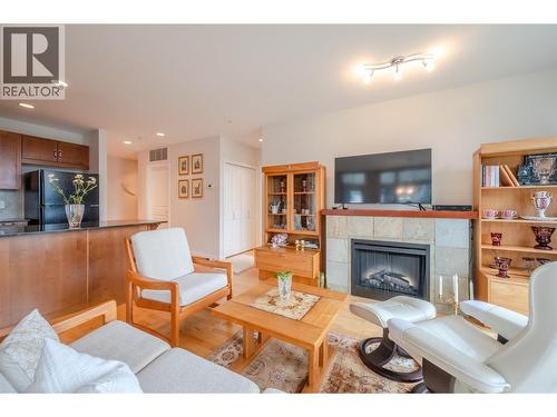 3301 Skaha Lake Road Unit# 406, Penticton, BC - Indoor Photo Showing Living Room With Fireplace