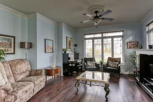 Living room - 222 Rue Elzéar-Verreault, Québec (Beauport), QC - Indoor Photo Showing Living Room With Fireplace
