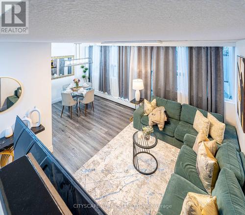 115 - 2121 Roche Court, Mississauga, ON - Indoor Photo Showing Living Room