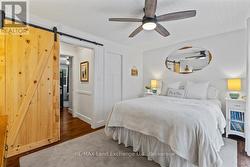 Primary Bedroom - walk-in closet & cheater ensuite - 