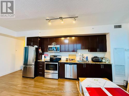 Lph1-15 - 7161 Yonge Street, Markham, ON - Indoor Photo Showing Kitchen With Stainless Steel Kitchen