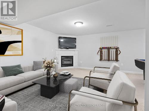 Virtual Staged Rec Room - 4 - 9440 Eagle Ridge Drive, Niagara Falls (Forestview), ON - Indoor Photo Showing Living Room With Fireplace