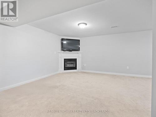 Rec Room - 4 - 9440 Eagle Ridge Drive, Niagara Falls (Forestview), ON - Indoor With Fireplace