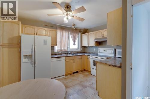 2 Deergrove Crescent, Regina, SK - Indoor Photo Showing Kitchen With Double Sink