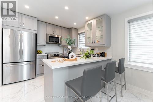 Breakfast Bar or Servery - 767 Phillip Murray Avenue, Oshawa, ON - Indoor Photo Showing Kitchen With Stainless Steel Kitchen With Upgraded Kitchen