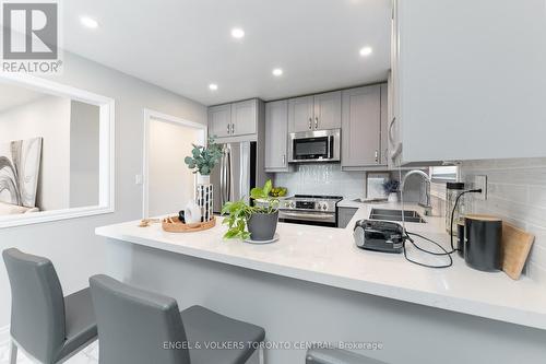 Passthru Window into the Living Area - 767 Phillip Murray Avenue, Oshawa, ON - Indoor Photo Showing Kitchen With Double Sink With Upgraded Kitchen