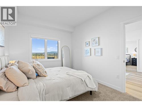 Bedroom 2- Photos are of a similar home; some features may vary - 1111 Frost Road Unit# 308, Kelowna, BC - Indoor Photo Showing Bedroom