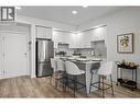 Foyer & Kitchen- Photos are of a similar home; some features may vary - 1111 Frost Road Unit# 308, Kelowna, BC  - Indoor Photo Showing Kitchen With Stainless Steel Kitchen With Upgraded Kitchen 