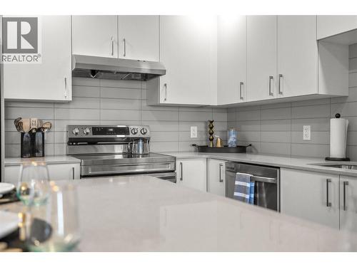 Kitchen- Photos are of a similar home; some features may vary - 1111 Frost Road Unit# 308, Kelowna, BC - Indoor Photo Showing Kitchen With Stainless Steel Kitchen With Upgraded Kitchen