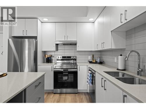 Kitchen- Photos are of a similar home; some features may vary - 1111 Frost Road Unit# 308, Kelowna, BC - Indoor Photo Showing Kitchen With Stainless Steel Kitchen With Double Sink With Upgraded Kitchen