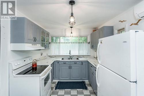 9 Harras Avenue, Tiny, ON - Indoor Photo Showing Kitchen With Double Sink