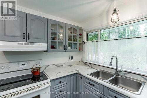 9 Harras Avenue, Tiny, ON - Indoor Photo Showing Kitchen With Double Sink
