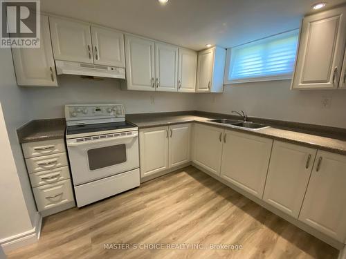 Basement - 906 Walnut Street W, Whitby, ON - Indoor Photo Showing Kitchen With Double Sink
