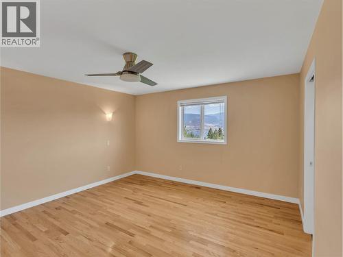 PRIMARY BEDROOM AS IS - 1893 Sandstone Drive, Penticton, BC - Indoor Photo Showing Other Room