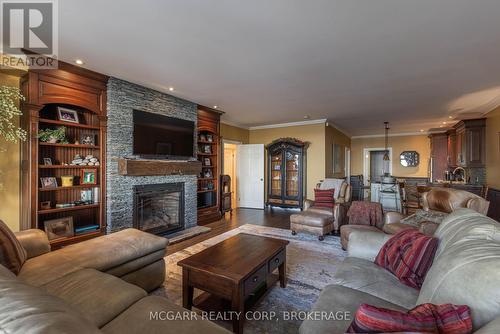 Lower family room - 89 October Drive, St. Catharines (Lakeshore), ON - Indoor Photo Showing Living Room With Fireplace