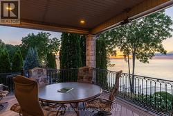 Covered + heated balcony off kitchen - 