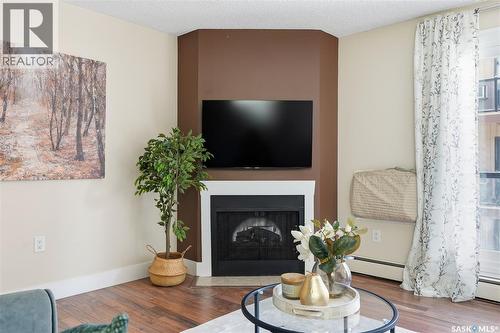 15 274 Pinehouse Drive, Saskatoon, SK - Indoor Photo Showing Living Room With Fireplace