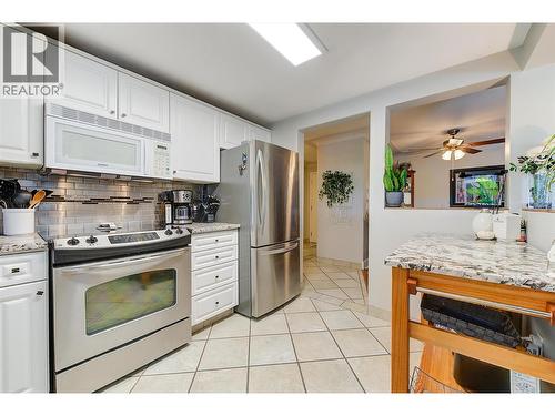 1964 Enterprise Way Unit# 309, Kelowna, BC - Indoor Photo Showing Kitchen With Stainless Steel Kitchen