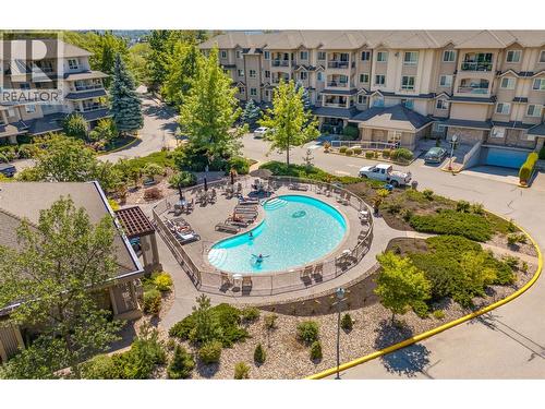 1964 Enterprise Way Unit# 309, Kelowna, BC - Outdoor With In Ground Pool