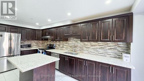 15 Redfinch Way N, Brampton, ON - Indoor Photo Showing Kitchen With Double Sink With Upgraded Kitchen