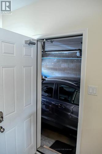 Entrance to Garage - 230 Waterbrook Lane, Kitchener, ON - Indoor Photo Showing Other Room