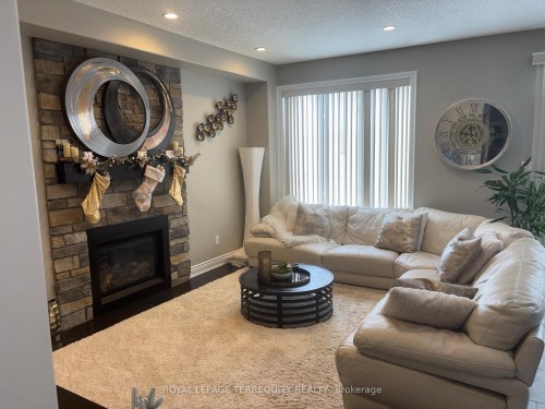 35 Marta Crescent, Barrie, ON - Indoor Photo Showing Living Room With Fireplace