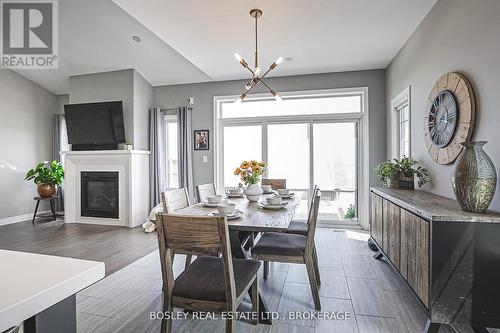 14 Cinnamon Street, Thorold (Rolling Meadows), ON - Indoor Photo Showing Dining Room With Fireplace