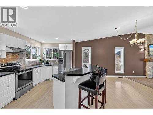 3319 Grouse Road, West Kelowna, BC - Indoor Photo Showing Kitchen With Fireplace With Upgraded Kitchen