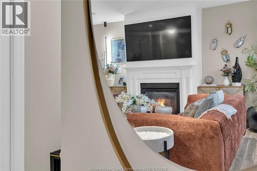 8475 Wyandotte Unit# 116, Windsor, ON - Indoor Photo Showing Living Room With Fireplace